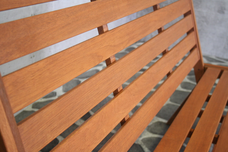 Banc de jardin en teck Meranti 150 cm | Tekora