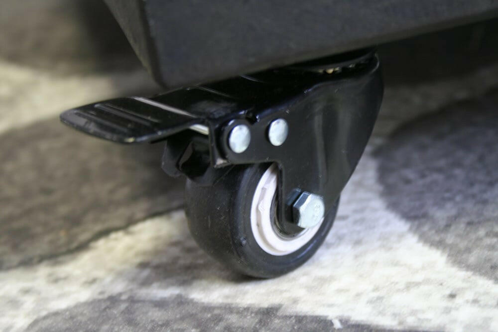 Parasolvoet op wielen: zwart graniet 100 kg..