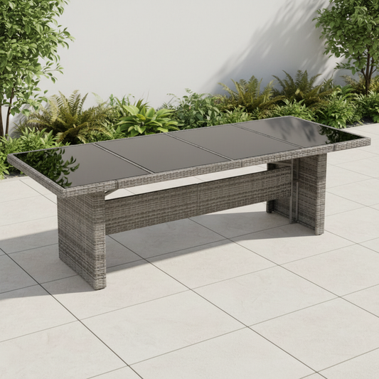 Grijze rotan tafel met zwart glas
