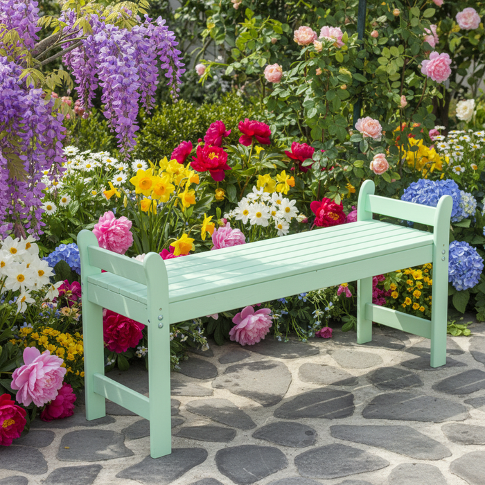 Tuinbank bij bloemenbed